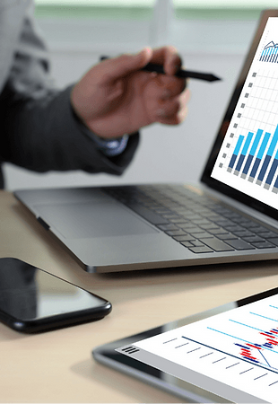 A graph being shown on a laptop, discussing data