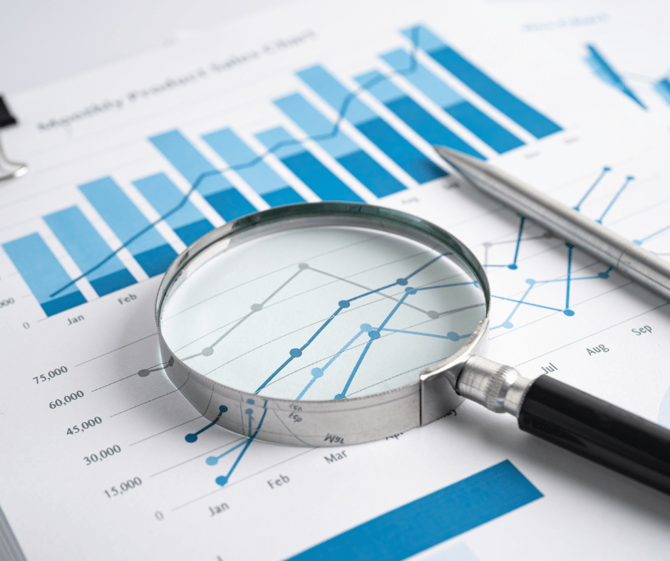 magnifying glass and graph