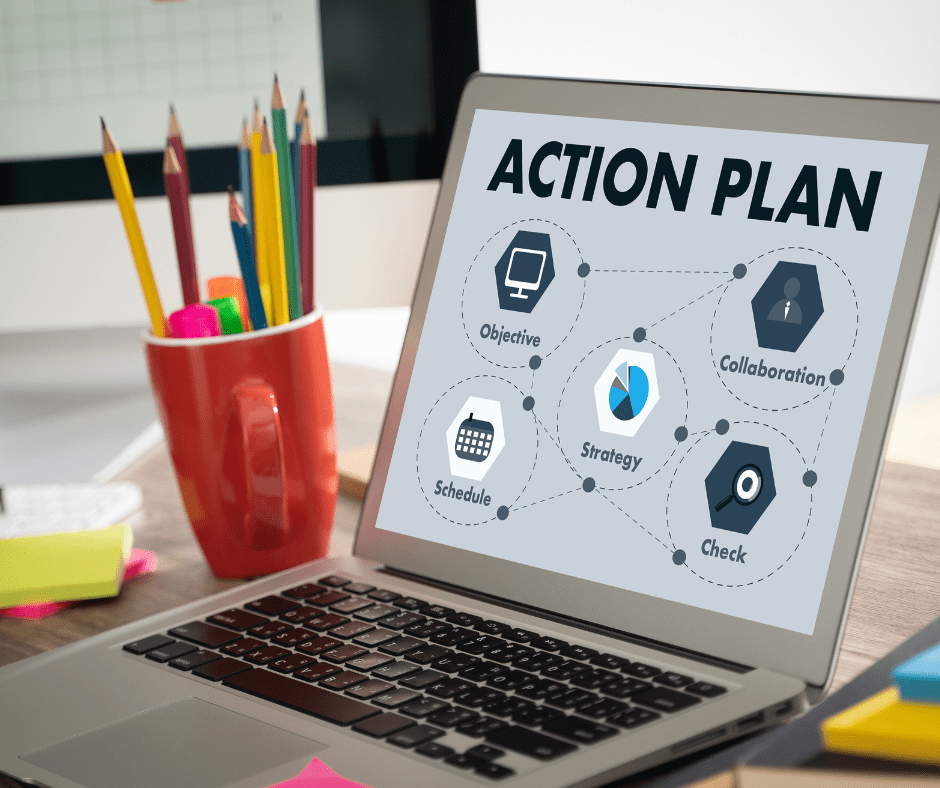 laptop with action plan words