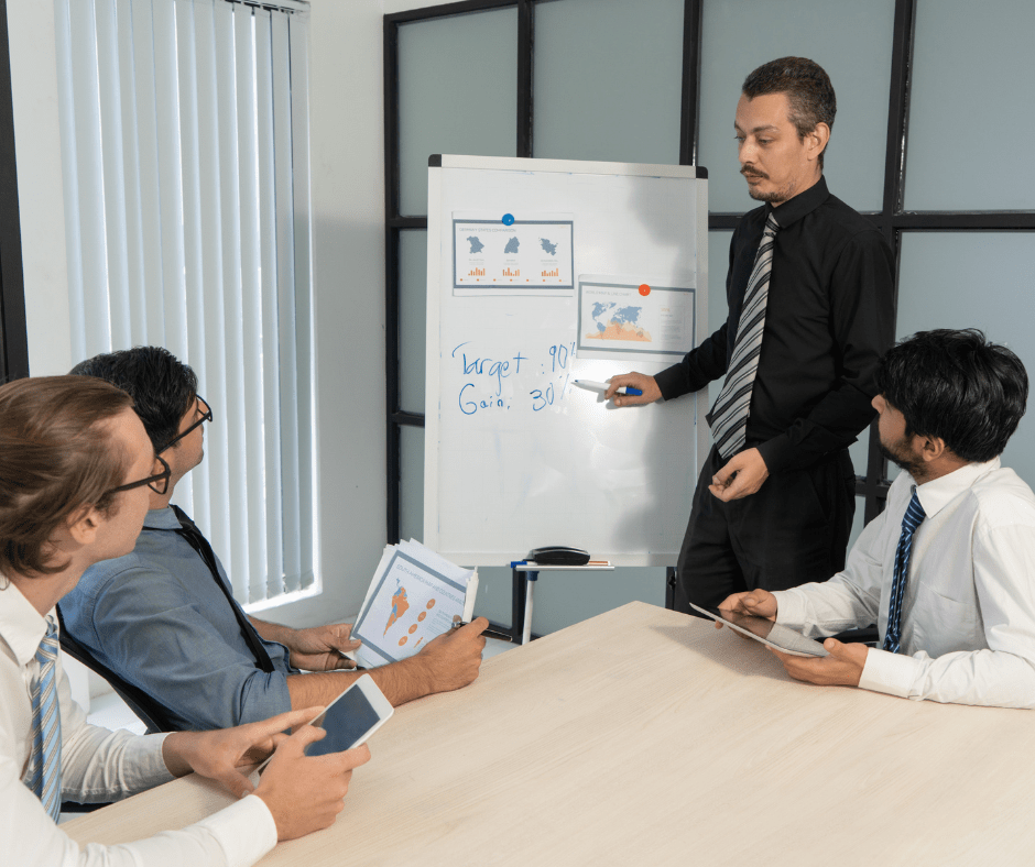 man standing teaching